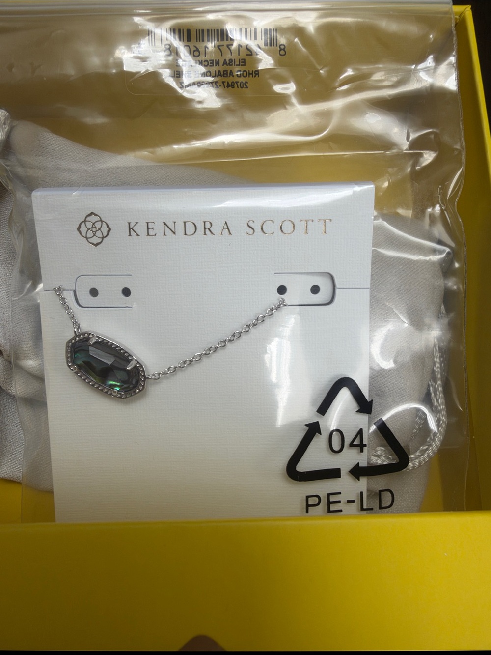 Kendra Scott Silver Necklace with Iridescent Teal Oval Stone